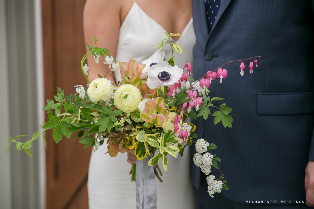 bride and groom with flowers